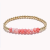 Bracelet perlé en pierre précieuse rose/pêche